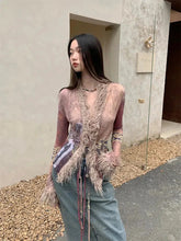 Top vintage con cordones y detalles de piel sintética