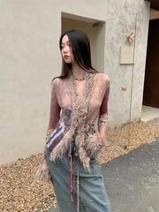 Top vintage con cordones y detalles de piel sintética