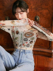 Transparentes Top mit Vintage-Symbolen