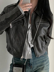 Chaqueta corta de cuero con cuello de solapa y cremallera
