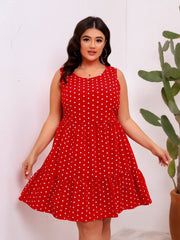 Vestido holgado de lunares, sin mangas, con cuello redondo y dobladillo grande con volantes