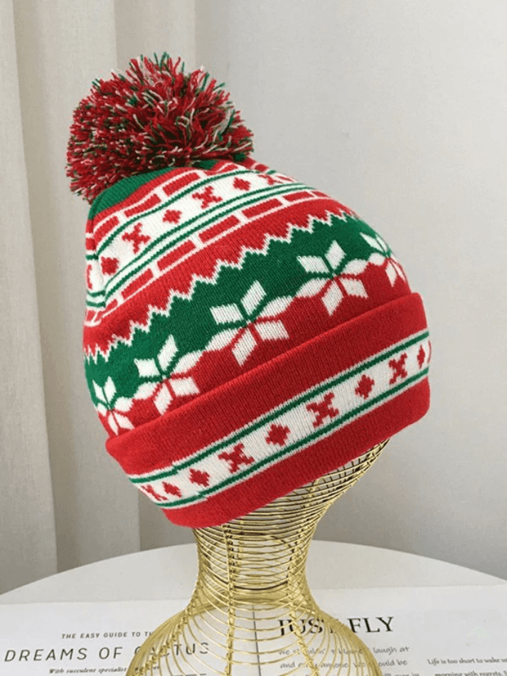 Knitted Christmas hat with jacquard pompoms