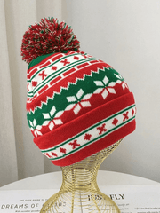 Knitted Christmas hat with jacquard pompoms