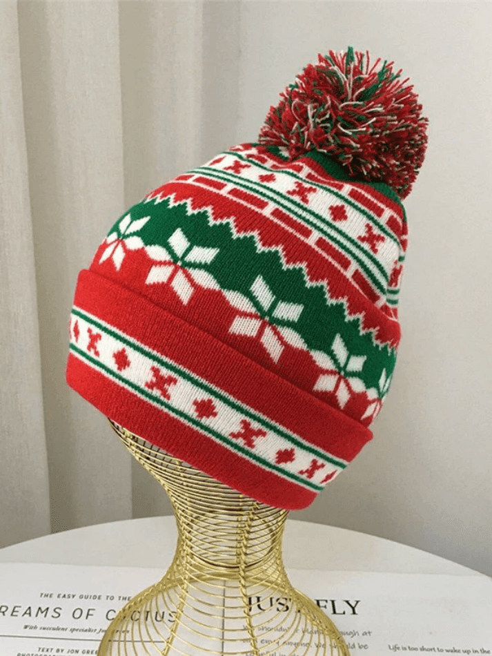 Knitted Christmas hat with jacquard pompoms