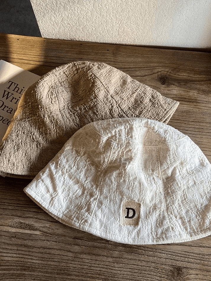 Ruched bucket hat with embroidered letters