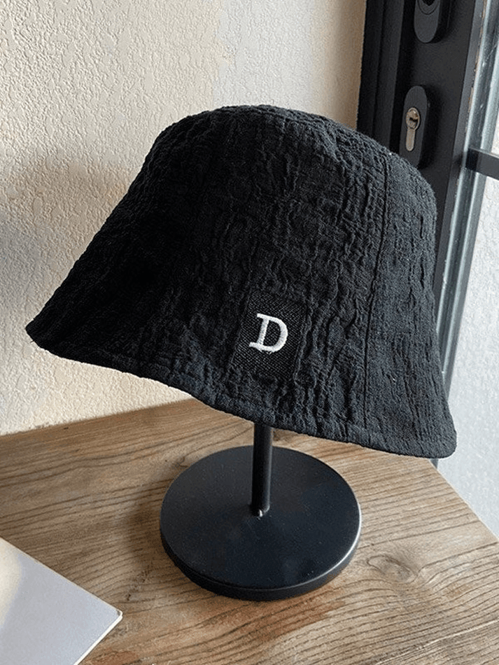 Ruched bucket hat with embroidered letters