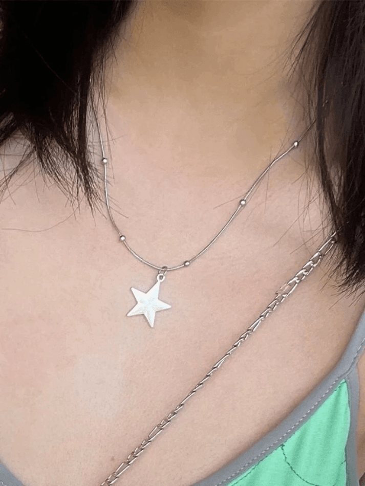 Collar vintage de estrella punk en plata