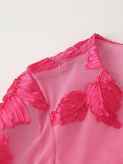 Vestido sin espalda de manga larga con estampado floral y placa tridimensional con abertura en la espalda y cuello redondo de otoño