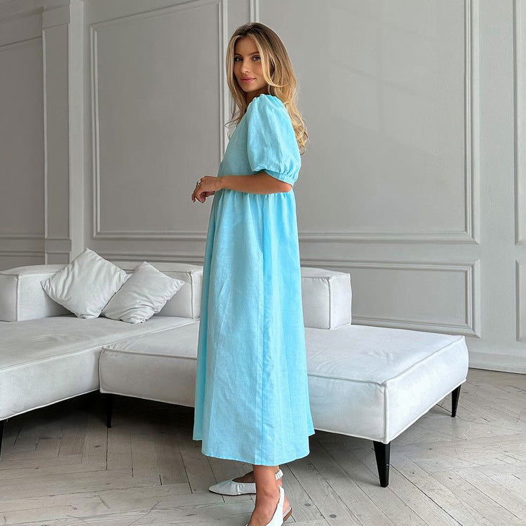 Vestido informal francés de manga abullonada con escote en V ligeramente maduro en azul.