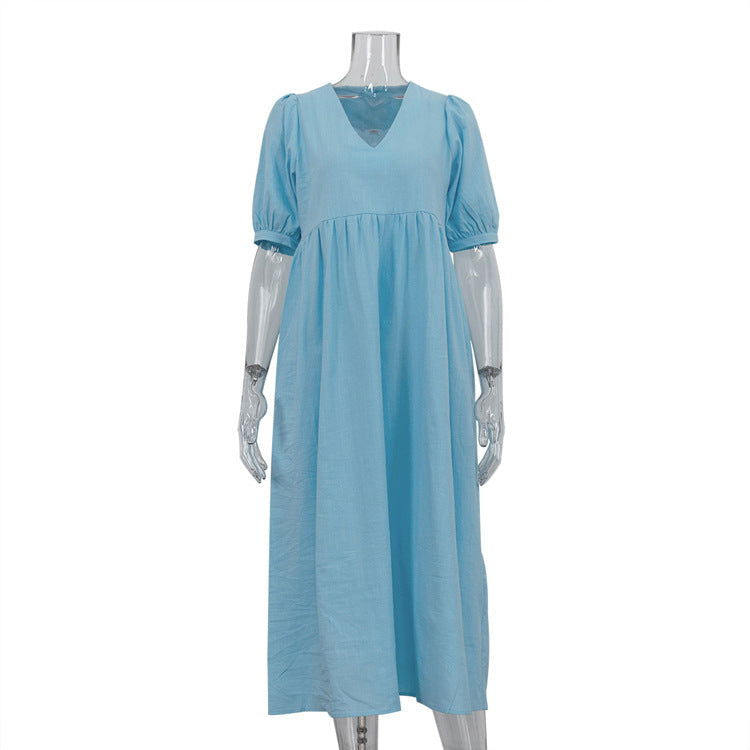 Vestido informal francés de manga abullonada con escote en V ligeramente maduro en azul.