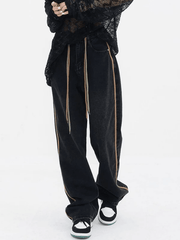 Boyfriend jeans with drawstring and side stripes