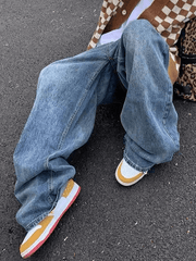 Washed blue belted boyfriend jeans