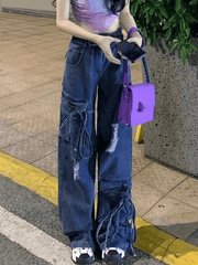 Ripped boyfriend jeans with tie belt