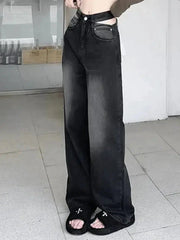Faded black cutout boyfriend jeans