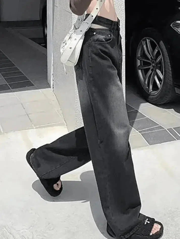 Faded black cutout boyfriend jeans