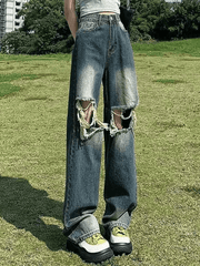 Faded straight jeans with ripped knees