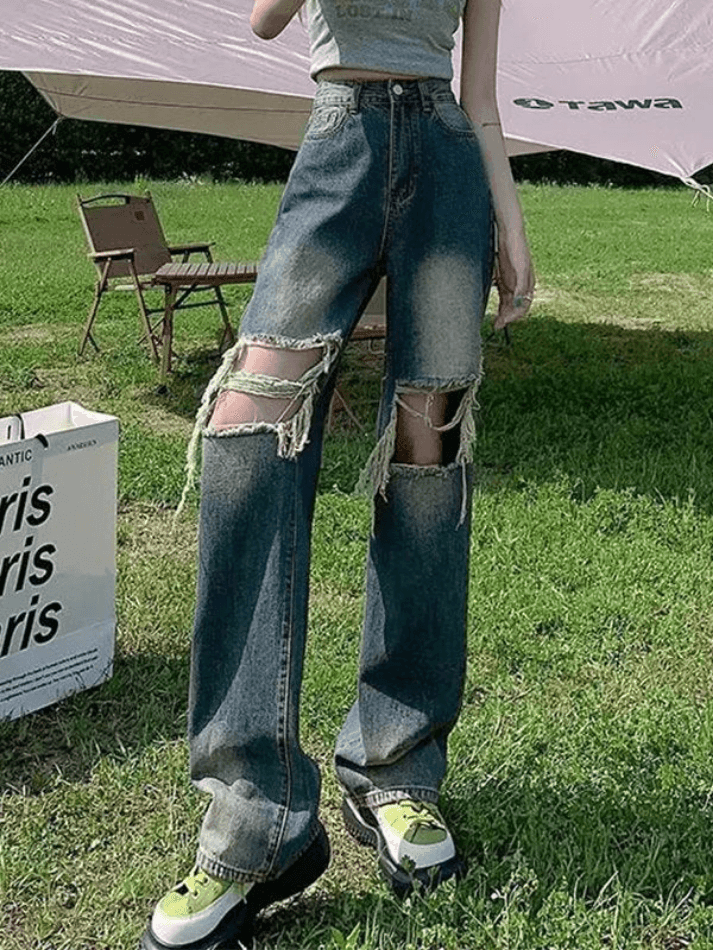 Faded straight jeans with ripped knees