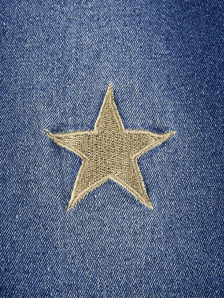 Flared jeans embroidered with stars
