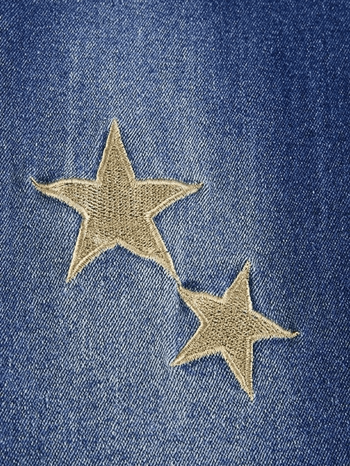 Flared jeans embroidered with stars