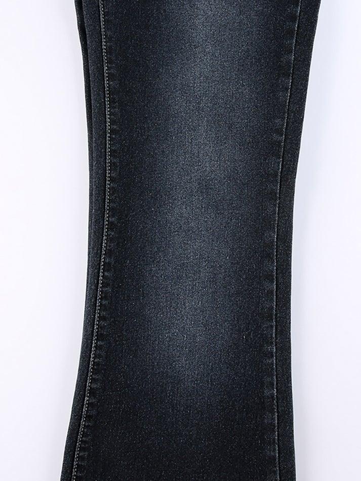 Faded low-rise flared jeans