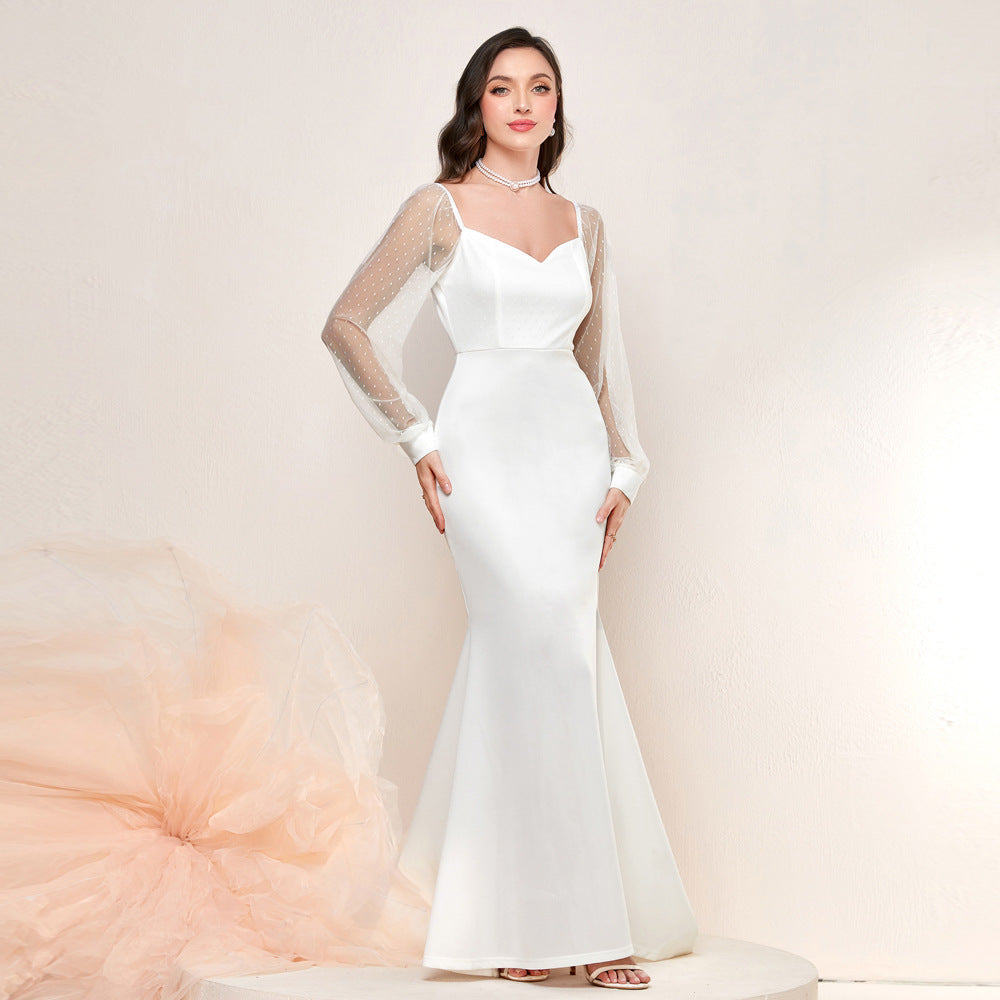 Vestido elegante francés con cola de pez y mangas de malla