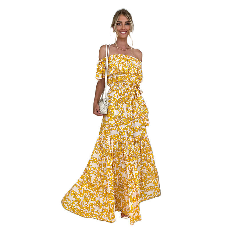 Vestido elegante de corte amplio con vuelo, hombros descubiertos y mangas con volantes y estampado floral