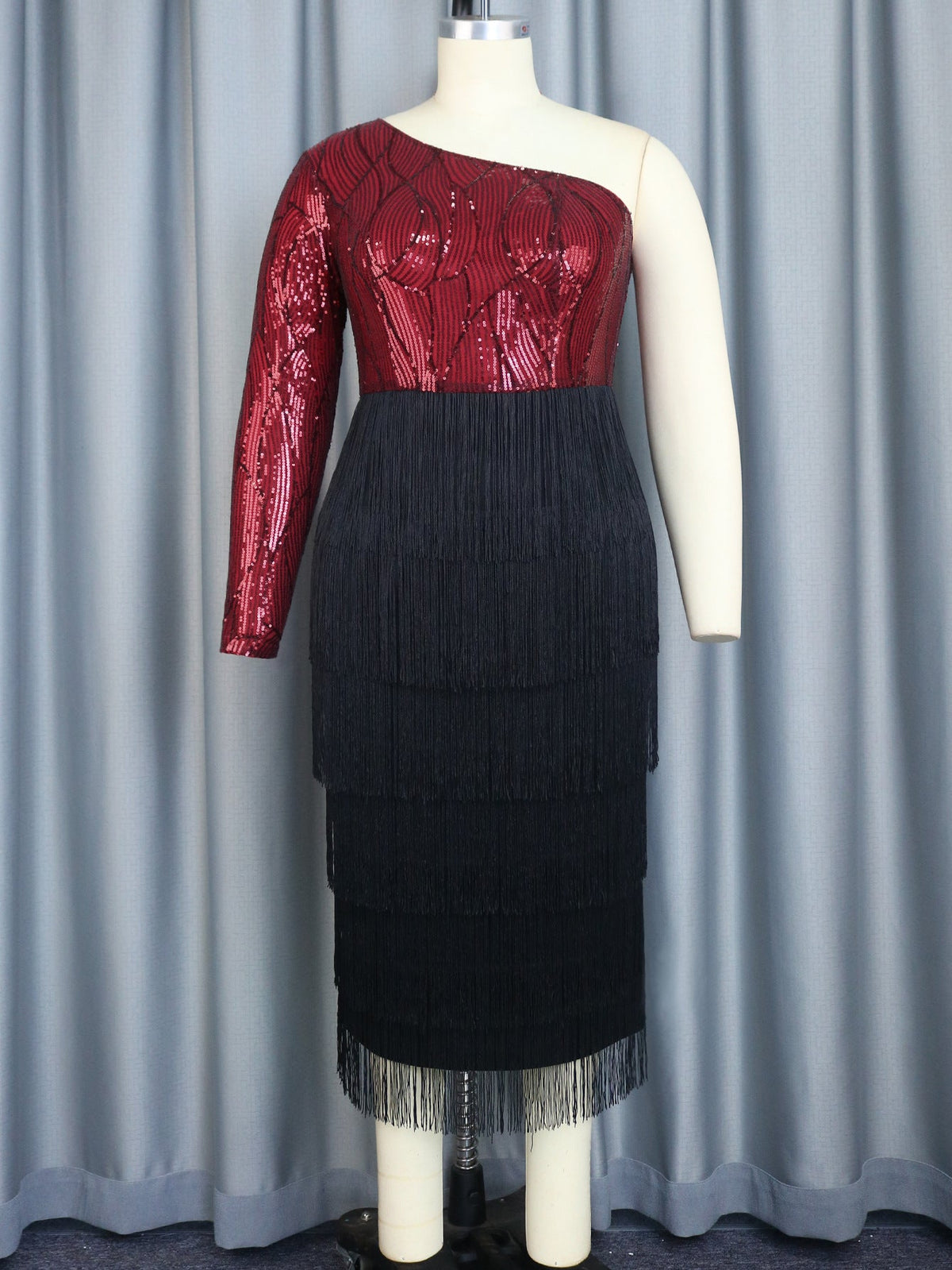 Vestido de lentejuelas de un solo hombro con cuello oblicuo y borlas para fiesta y cena
