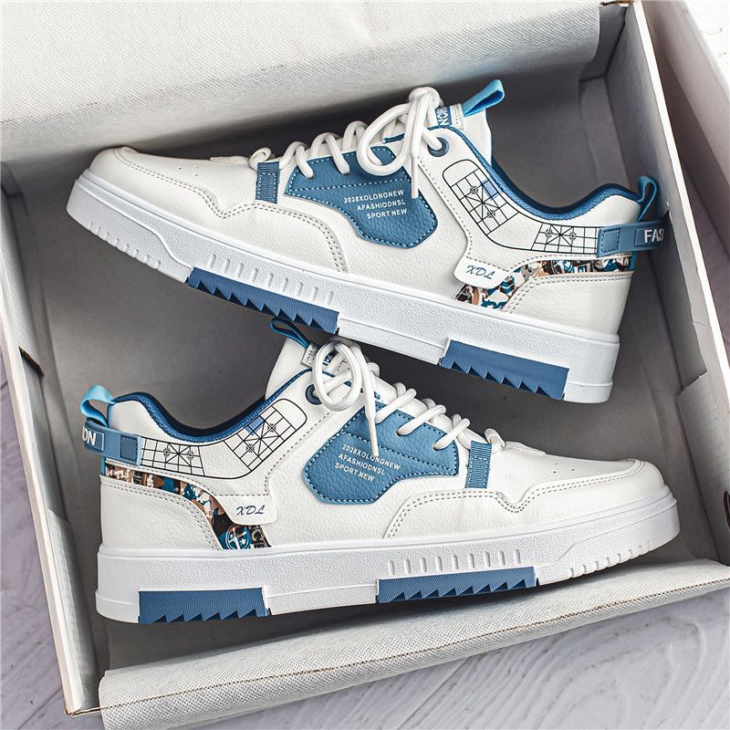 Zapatos deportivos casuales blancos de caña baja