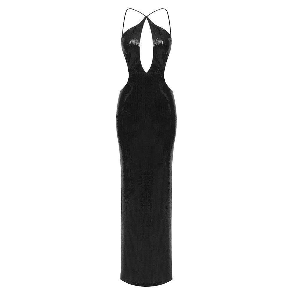 Vestido largo de lentejuelas con escote halter y espalda descubierta con corte de discoteca