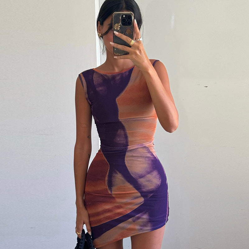 Vestido ajustado de otoño con cuello redondo, espalda descubierta y estampado