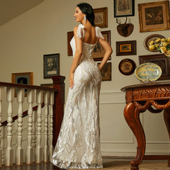 Vestido de noche elegante sin mangas largo con lentejuelas y escote descubierto y espalda descubierta para dama de honor con lazo de lentejuelas