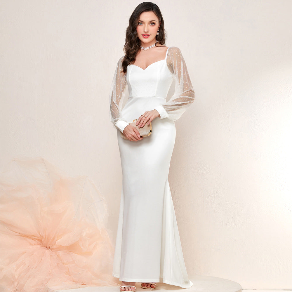 Vestido elegante francés con cola de pez y mangas de malla