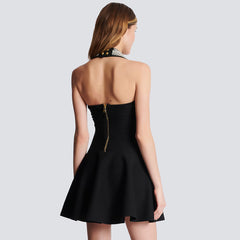 Vestido negro sin mangas de estilo industrial pesado con cuentas, corte A, estilo vendaje, ajustado.