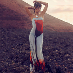 Vestido largo con tirantes transparentes y estampado con escote pronunciado