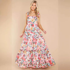 Elegantes kragenfreies Kleid mit Blumenmuster und Trägern