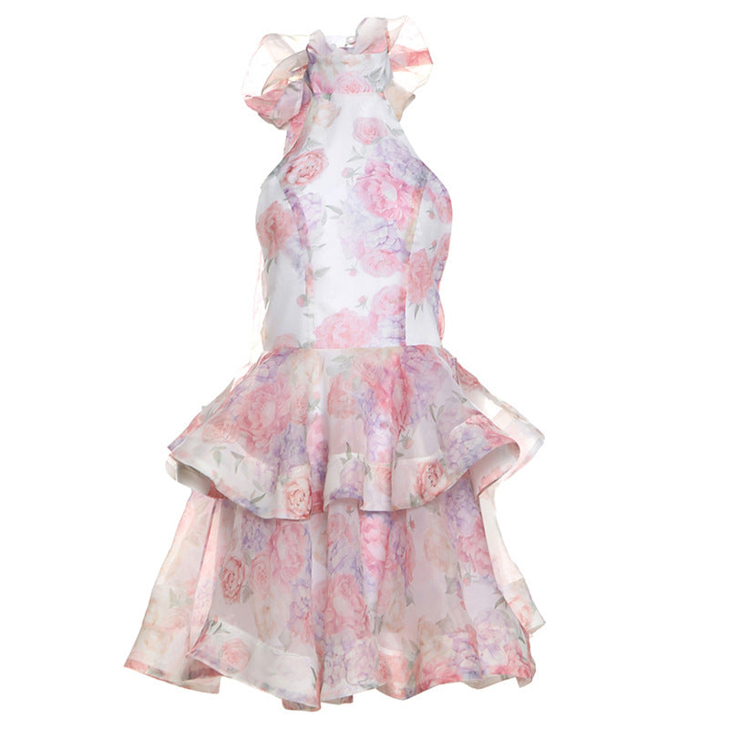 Vestido corto ajustado con cuello halter, espalda descubierta y estampado