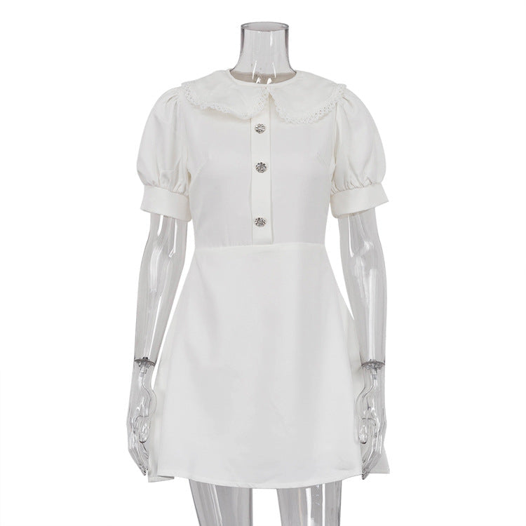 Vestido francés de corte en A elegante, cuello Peter Pan, manga corta y corte entallado.