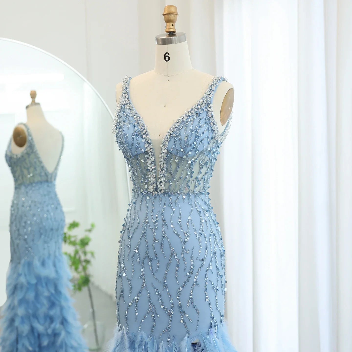 Blue Mermaid Evening Gown with Feather Details