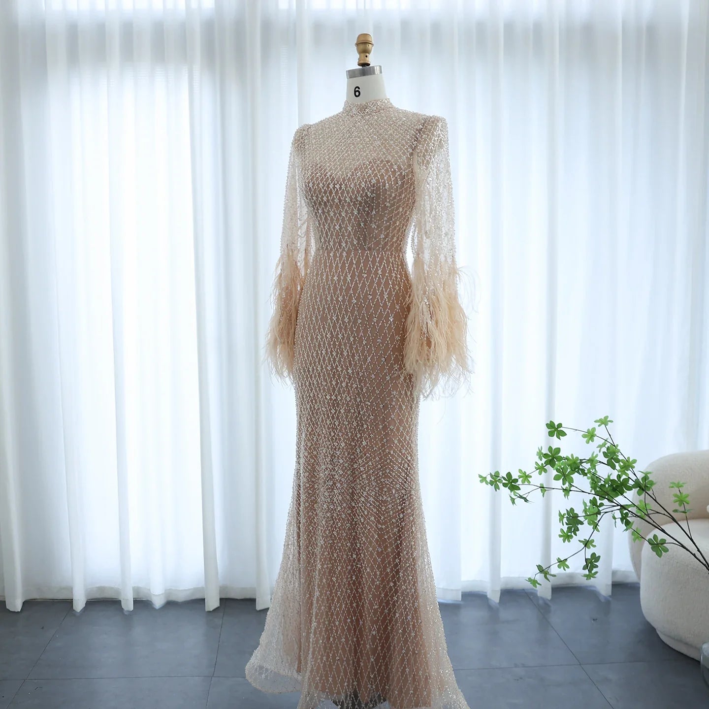 Feather Embellished Evening Gown with Long Sleeves
