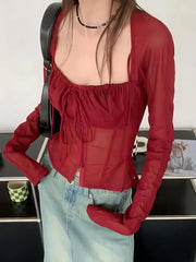 Top fruncido con encaje transparente