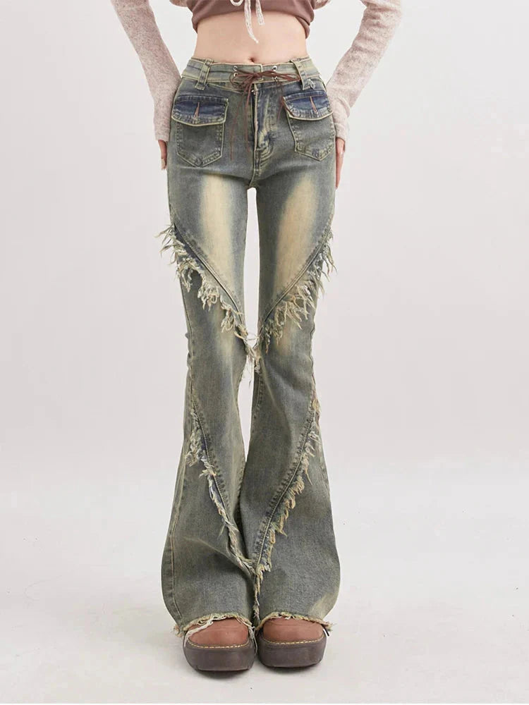 Weiche Grunge-Schlagjeans mit Quasten