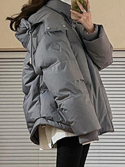 Pufferjacke mit Kapuze und Herzverzierung