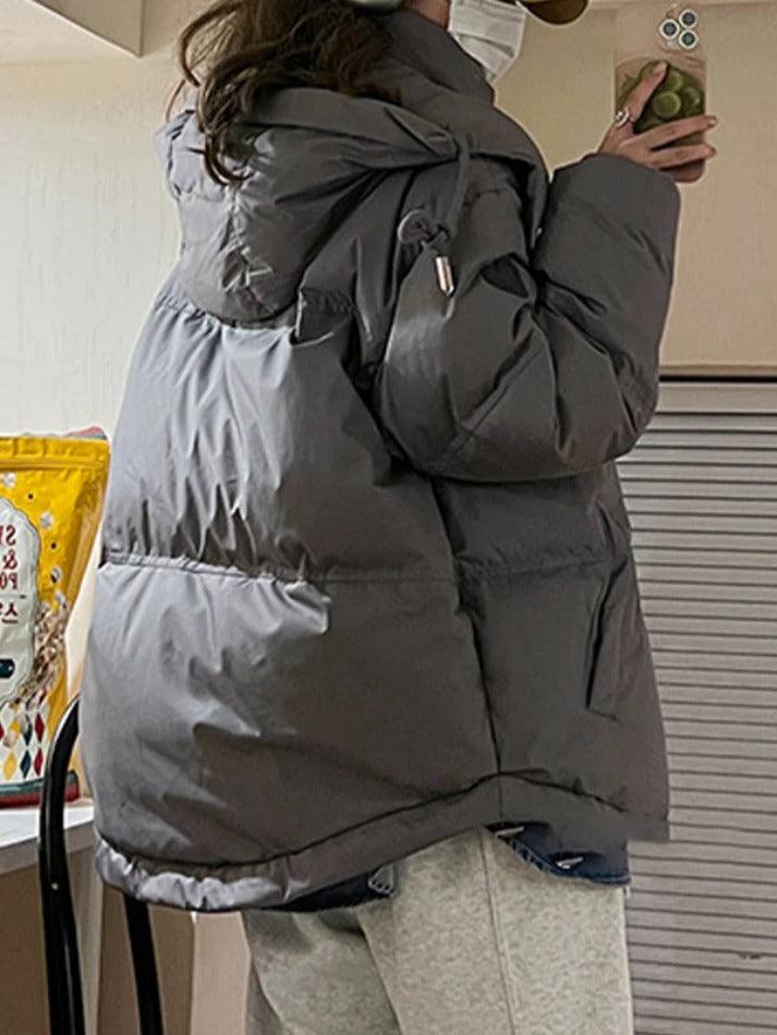 Pufferjacke mit Kapuze und Herzverzierung