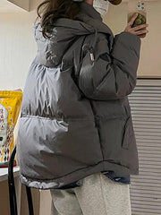 Pufferjacke mit Kapuze und Herzverzierung