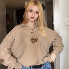 Sweatshirt mit Knopfleiste und Sonnenstickerei