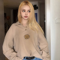 Sweatshirt mit Knopfleiste und Sonnenstickerei