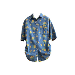 Camisa vaquera con girasoles
