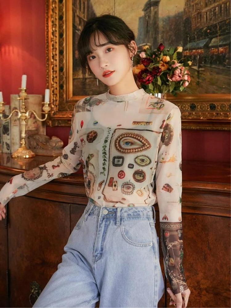 Top transparente con símbolos vintage